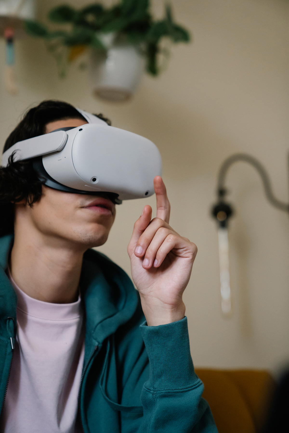 Young man experiencing virtual reality in headset